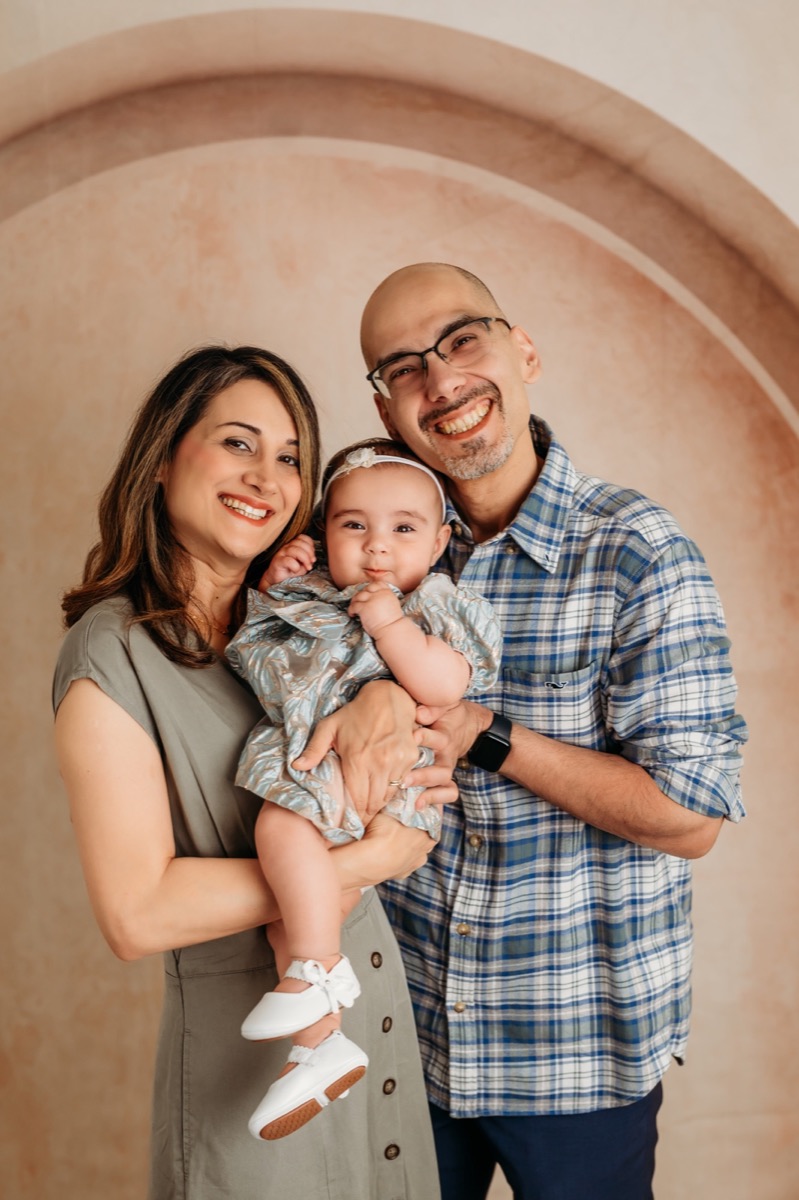 Dr. Kavand with her husband and daughter, Lillian